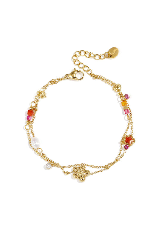 Bedelarmband met ster en bloemcharms, parels, steentjes en kraaltjes